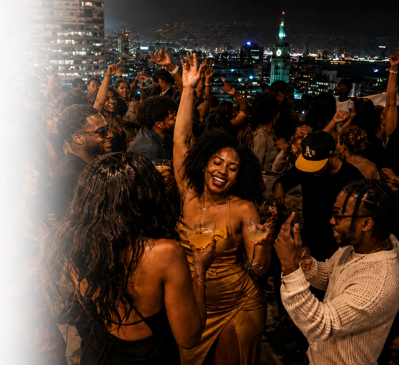 A rooftop crowd celebrating at night